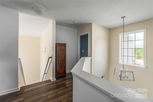 89 Woodfern Rd, Fletcher, NC 28732 - corridor featuring an upstairs landing, dark wood-style floors, and a textured ceiling