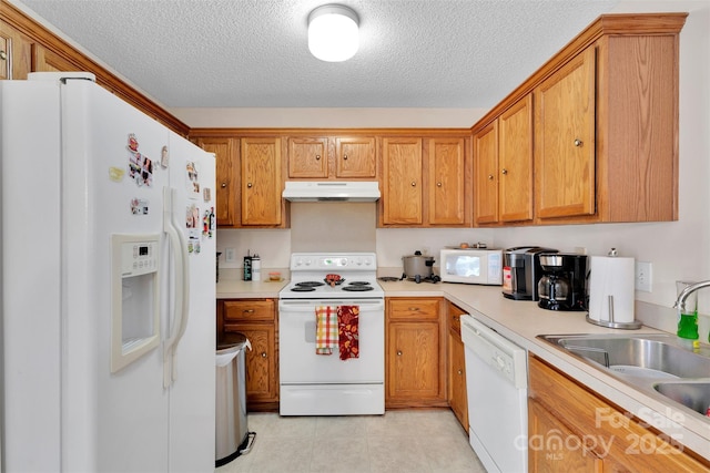 15248 Pangborn Pl, Charlotte, NC 28278 - kitchen with white appliances, under cabinet range hood, a textured ceiling, brown cabinetry, and light countertops