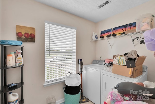 15248 Pangborn Pl, Charlotte, NC 28278 - laundry area with washing machine and dryer and a textured ceiling