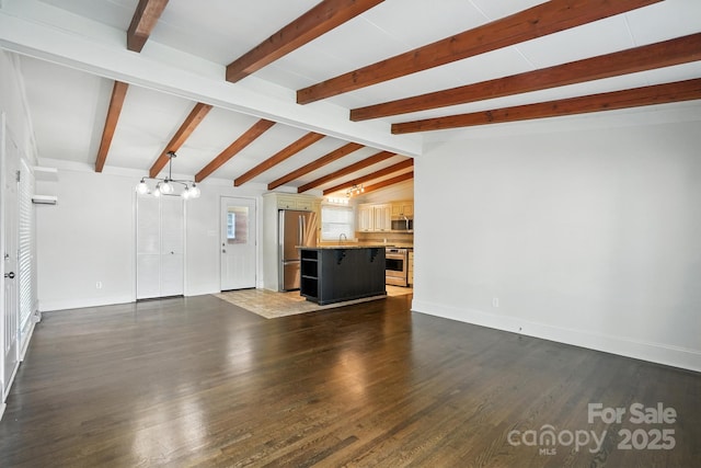 5229 Milford Rd, Charlotte, NC 28210 - unfurnished living room with a chandelier and dark wood-type flooring