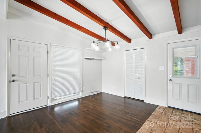5229 Milford Rd, Charlotte, NC 28210 - foyer featuring beamed ceiling, a chandelier, and dark wood-style floors
