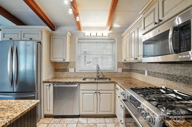 5229 Milford Rd, Charlotte, NC 28210 - kitchen with stainless steel appliances, backsplash, beam ceiling, light stone countertops, and cream cabinets