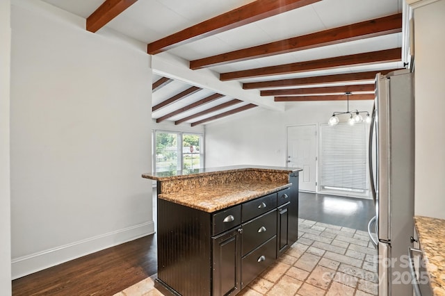 5229 Milford Rd, Charlotte, NC 28210 - kitchen featuring freestanding refrigerator and a center island
