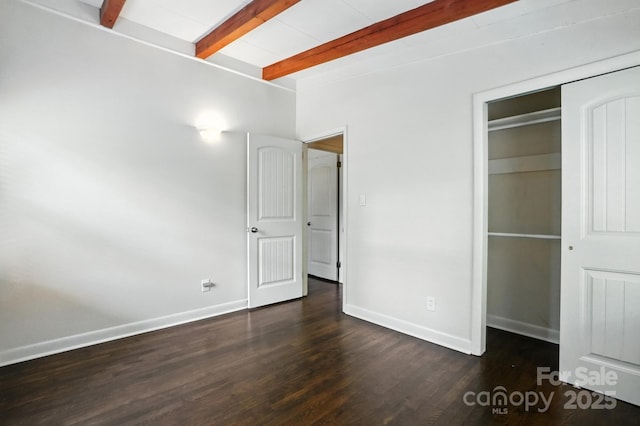 5229 Milford Rd, Charlotte, NC 28210 - unfurnished bedroom featuring beam ceiling, wood finished floors, and a closet