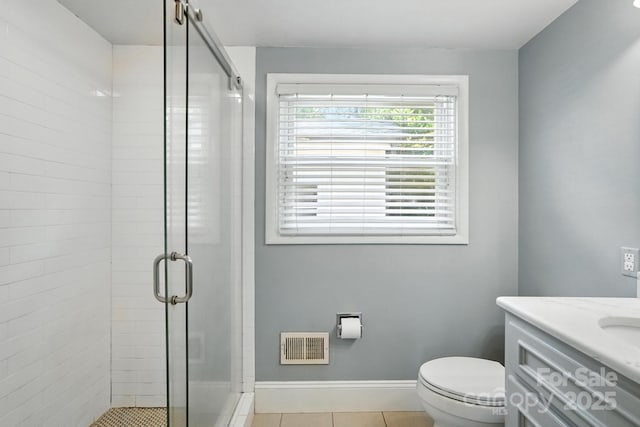 5229 Milford Rd, Charlotte, NC 28210 - full bath with a stall shower, vanity, and tile patterned flooring