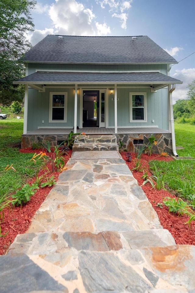 308 Hickory St, Granite Falls, NC 28630 - view of front of home featuring roof with shingles and covered porch