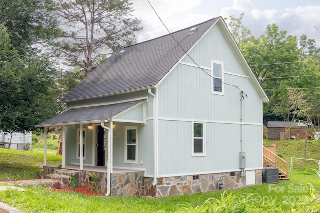 308 Hickory St, Granite Falls, NC 28630 - view of home's exterior with covered porch and roof with shingles
