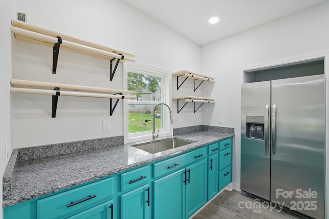 308 Hickory St, Granite Falls, NC 28630 - kitchen with stainless steel fridge with ice dispenser, open shelves, wood finished floors, blue cabinets, and recessed lighting