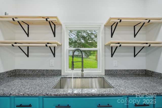 308 Hickory St, Granite Falls, NC 28630 - kitchen with blue cabinetry and stone countertops