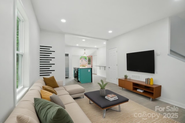 308 Hickory St, Granite Falls, NC 28630 - living room featuring light wood-type flooring and recessed lighting