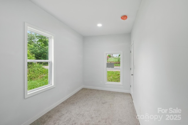 308 Hickory St, Granite Falls, NC 28630 - empty room with healthy amount of natural light, light colored carpet, and recessed lighting