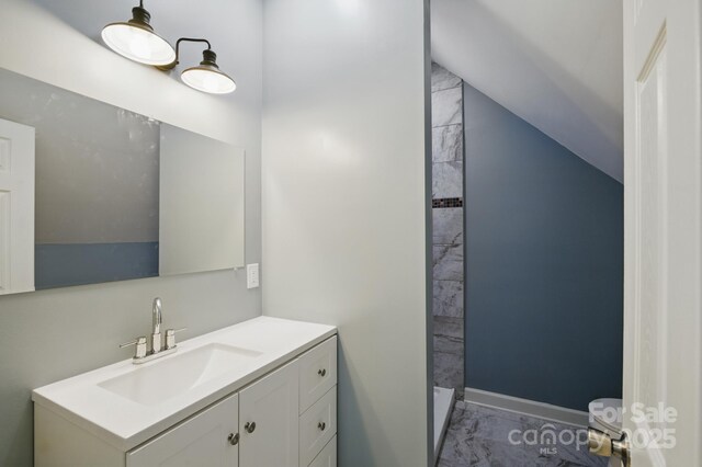 308 Hickory St, Granite Falls, NC 28630 - bathroom featuring marble finish floors, vanity, and a shower