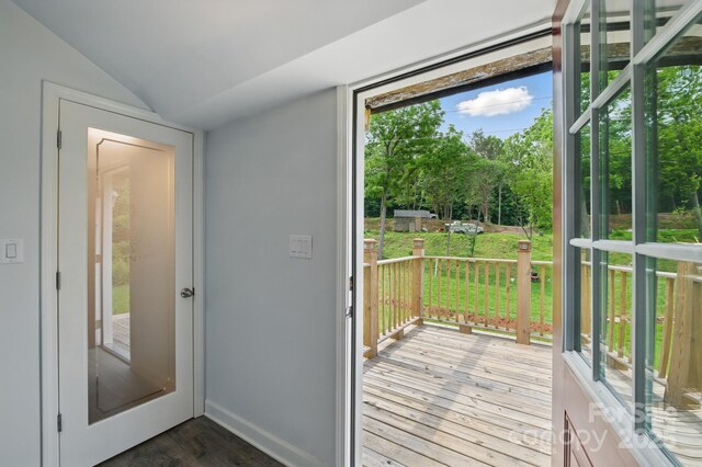 308 Hickory St, Granite Falls, NC 28630 - doorway with wood finished floors, vaulted ceiling, and view of scattered trees