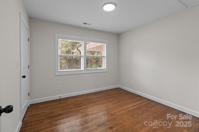 1115 Sides Rd, Salisbury, NC 28146 - unfurnished bedroom with wood finished floors and baseboards