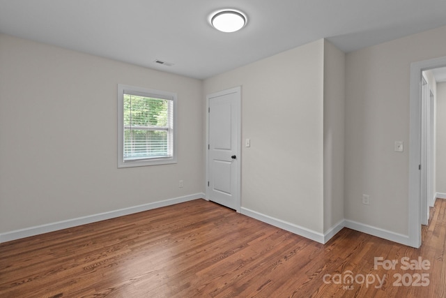 1115 Sides Rd, Salisbury, NC 28146 - unfurnished room featuring wood finished floors and baseboards