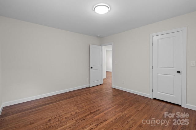1115 Sides Rd, Salisbury, NC 28146 - unfurnished bedroom featuring wood finished floors and baseboards