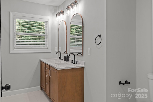 1115 Sides Rd, Salisbury, NC 28146 - bathroom with plenty of natural light, double vanity, and tile patterned floors