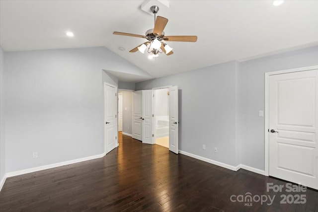 2527 Fossil Stone Ln, Fort Mill, SC 29708 - unfurnished bedroom with dark wood-style floors, vaulted ceiling, recessed lighting, ensuite bath, and ceiling fan