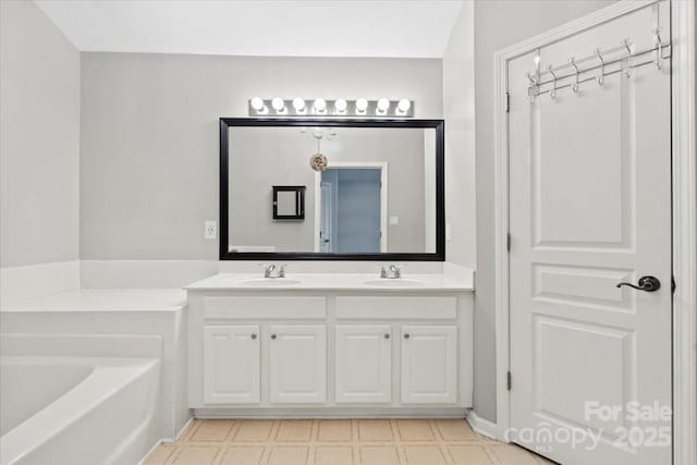 2527 Fossil Stone Ln, Fort Mill, SC 29708 - full bath featuring double vanity, tile patterned floors, and a garden tub