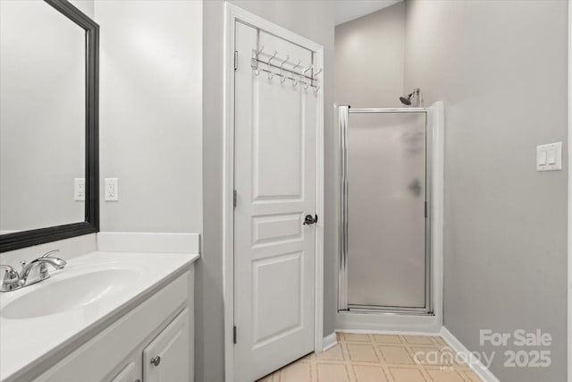2527 Fossil Stone Ln, Fort Mill, SC 29708 - bathroom featuring a shower stall, vanity, and tile patterned floors