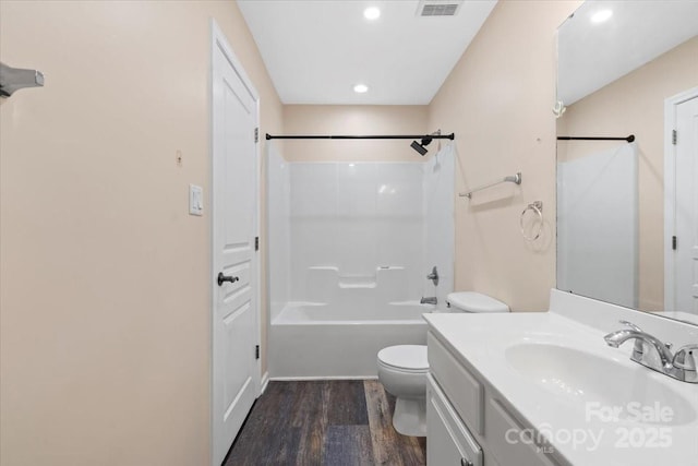2527 Fossil Stone Ln, Fort Mill, SC 29708 - bathroom featuring vanity, wood finished floors,  shower combination, and recessed lighting