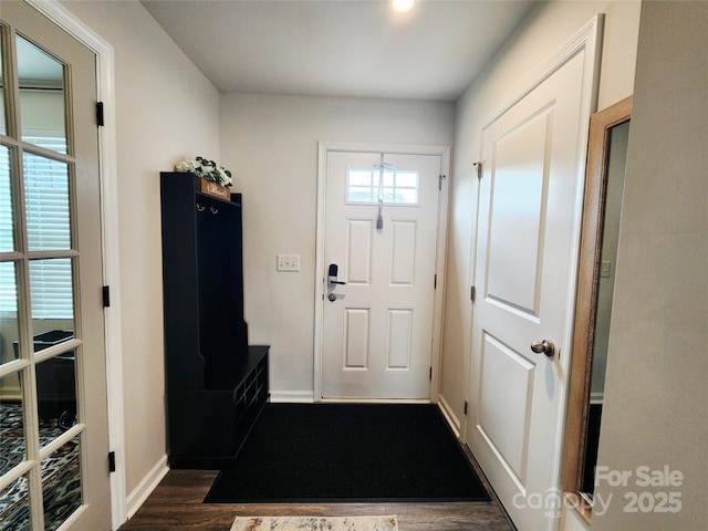 1047 Campbell Chase Ln SW, Concord, NC 28025 - foyer with dark wood-type flooring and baseboards