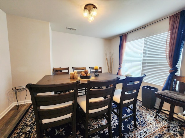 1047 Campbell Chase Ln SW, Concord, NC 28025 - dining space with baseboards and wood finished floors