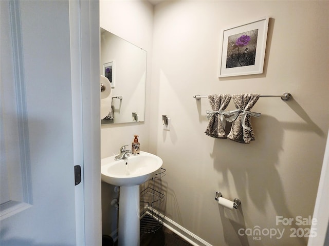 1047 Campbell Chase Ln SW, Concord, NC 28025 - half bathroom with baseboards