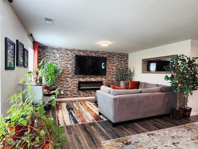 1047 Campbell Chase Ln SW, Concord, NC 28025 - living room with wood finished floors and a stone fireplace