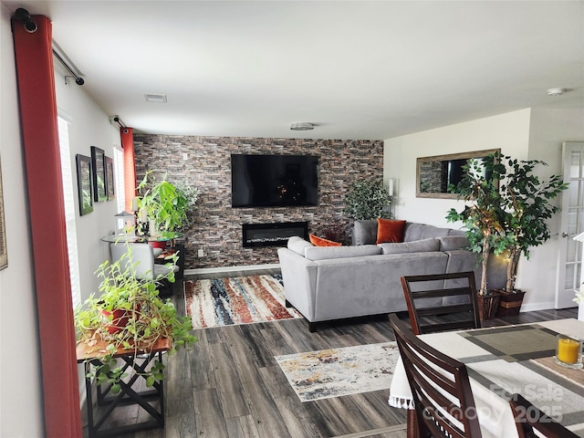 1047 Campbell Chase Ln SW, Concord, NC 28025 - living area featuring wood finished floors and a fireplace