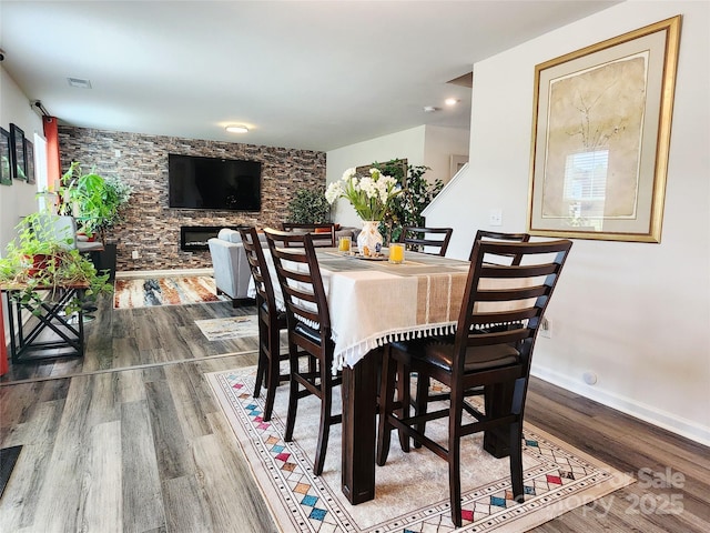 1047 Campbell Chase Ln SW, Concord, NC 28025 - dining area with wood finished floors and baseboards