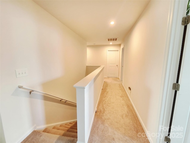 1047 Campbell Chase Ln SW, Concord, NC 28025 - hall featuring light colored carpet, an upstairs landing, and recessed lighting