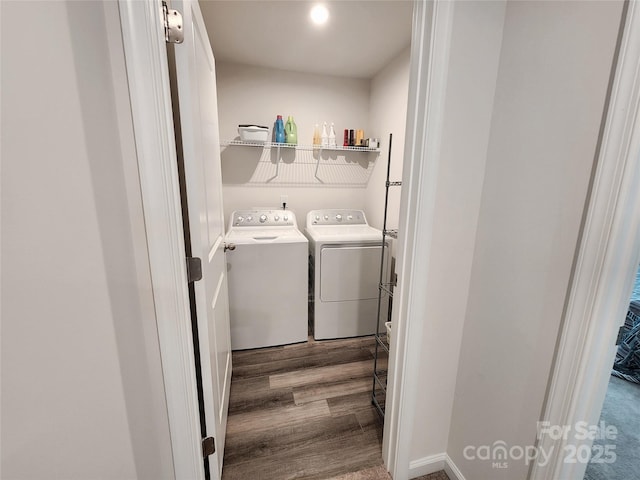 1047 Campbell Chase Ln SW, Concord, NC 28025 - laundry room with separate washer and dryer and wood finished floors