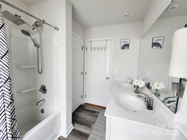 1047 Campbell Chase Ln SW, Concord, NC 28025 - full bathroom with wood finished floors, shower / bath combo, and double vanity