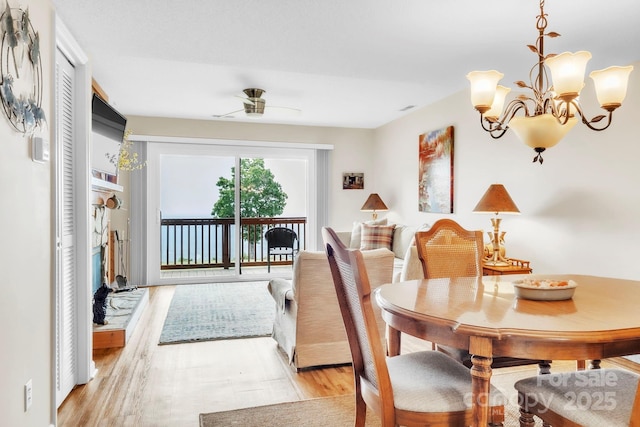 2881 White Oak Mountain Rd Unit D5, Columbus, NC 28722 - dining space with a chandelier and light wood-type flooring