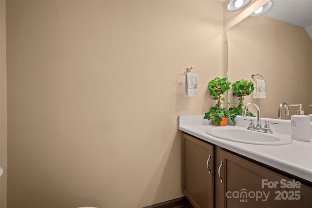 2881 White Oak Mountain Rd Unit D5, Columbus, NC 28722 - half bathroom featuring vanity and toilet