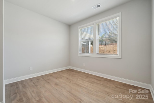 308 Alameda Way, Matthews, NC 28104 - empty room with baseboards and light wood finished floors
