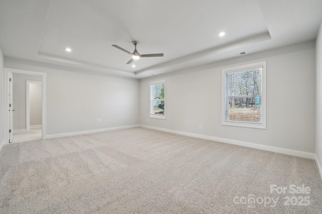 308 Alameda Way, Matthews, NC 28104 - carpeted empty room with a tray ceiling, recessed lighting, and ceiling fan