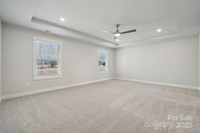 308 Alameda Way, Matthews, NC 28104 - carpeted spare room with a tray ceiling, recessed lighting, a ceiling fan, and plenty of natural light