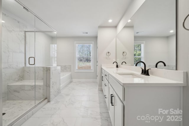 308 Alameda Way, Matthews, NC 28104 - bathroom with marble look tile flooring, a garden tub, healthy amount of natural light, a marble finish shower, and recessed lighting