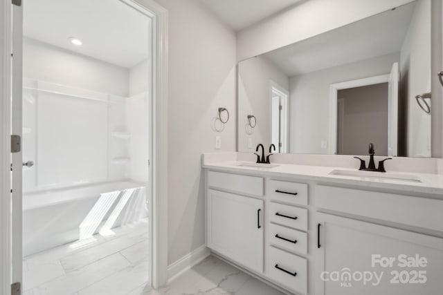 308 Alameda Way, Matthews, NC 28104 - full bath with marble look tiles and double vanity