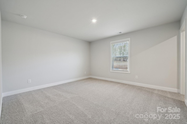 308 Alameda Way, Matthews, NC 28104 - empty room with carpet floors, recessed lighting, and a smoke detector