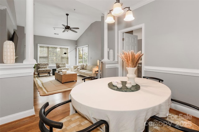 5730 Closeburn Rd Unit N, Charlotte, NC 28210 - dining area with ornate columns, light wood-type flooring, ceiling fan, and lofted ceiling