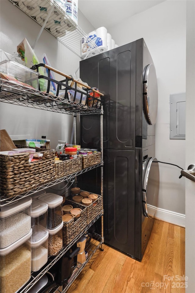 5730 Closeburn Rd Unit N, Charlotte, NC 28210 - pantry with stacked washer and clothes dryer and electric panel