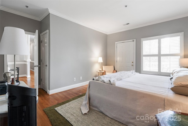 5730 Closeburn Rd Unit N, Charlotte, NC 28210 - bedroom with wood finished floors and ornamental molding