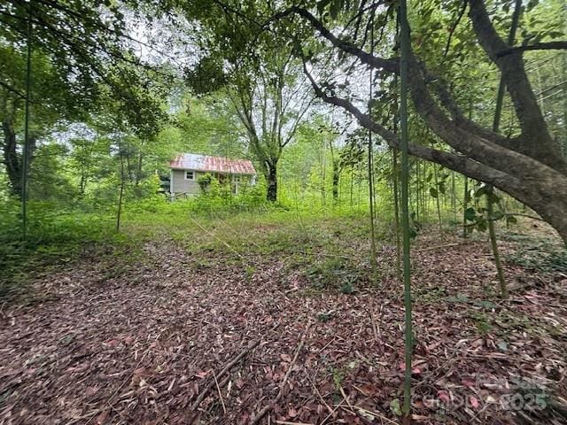 69 Ginger Snap Dr, Nebo, NC 28761 - view of yard featuring a wooded view