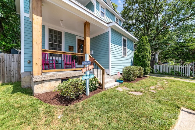 501 Mercury St, Charlotte, NC 28205 - property entrance with a porch