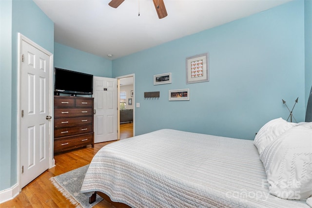 501 Mercury St, Charlotte, NC 28205 - bedroom with light wood-style flooring and ceiling fan