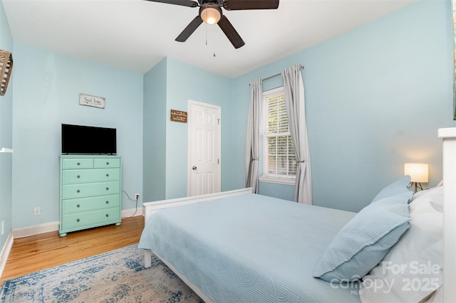 501 Mercury St, Charlotte, NC 28205 - bedroom with wood finished floors and a ceiling fan