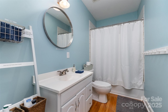 501 Mercury St, Charlotte, NC 28205 - bathroom with vanity, wood finished floors, and shower / bath combo